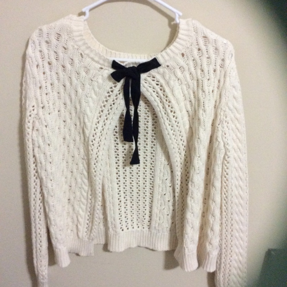 Open Back Sweater with a Black Tie
